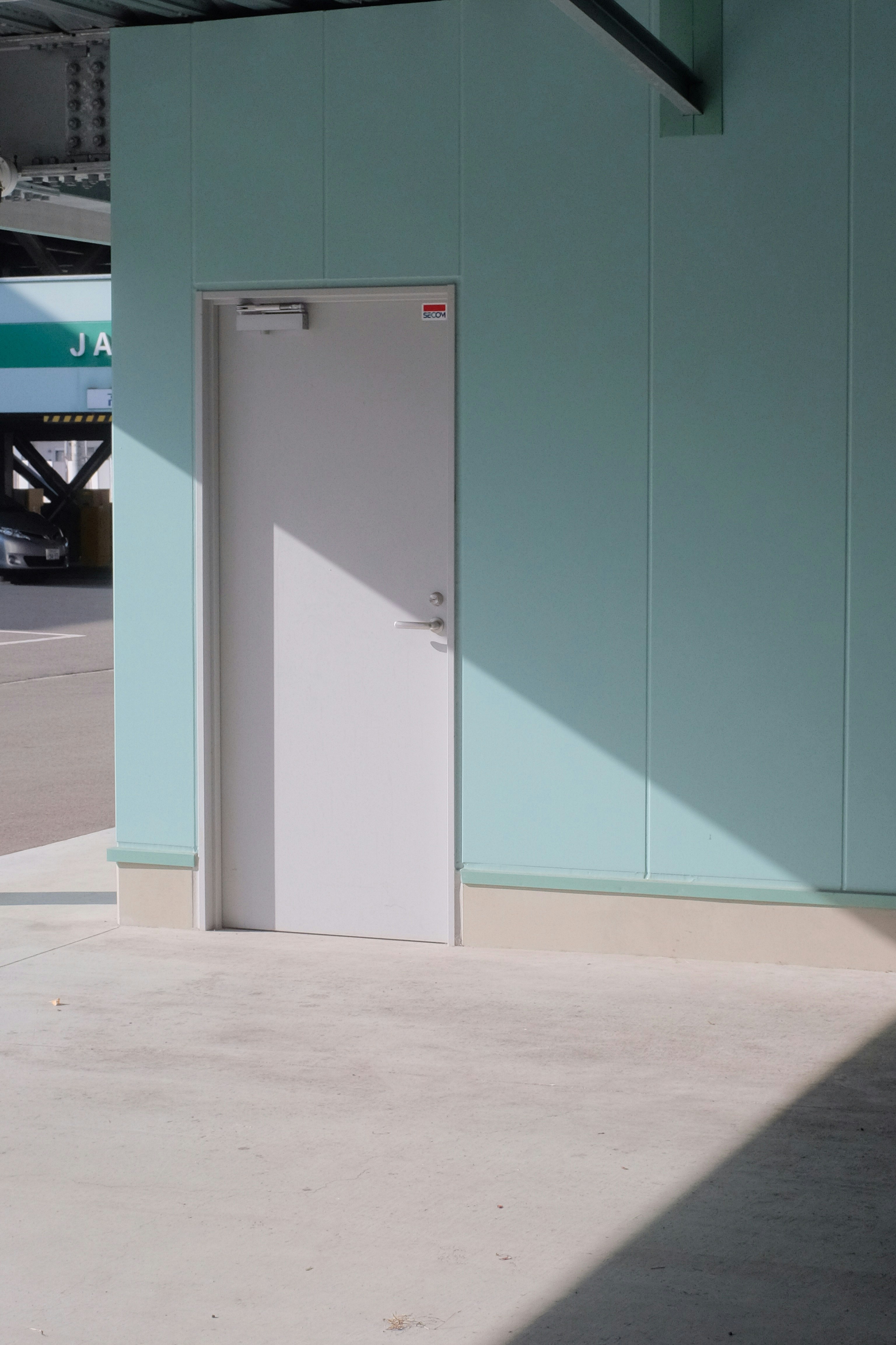 gray metal cabinet near gray concrete road